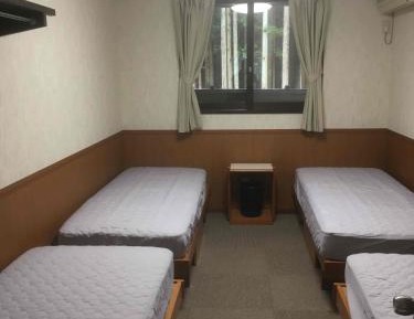 Quadruple Room with Shared Bathroom