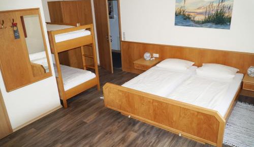 Quadruple Room (2 Adults + 2 Children)
