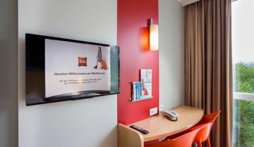 Superior Room with Balcony including a coffee machine