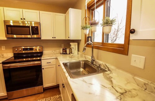 Lake Delton Condo | Waterfront Boho Retreat