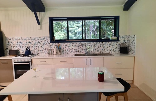 Thornton Beach House | beach over road, rainforest, cassowary, goanna , beach cafe, king bed , air con