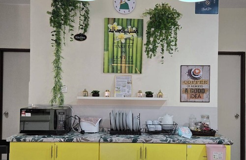 Kampung Bukit Rangin House | Spacious 4-bedroom house with WiFi, AC in welcoming Kuantan