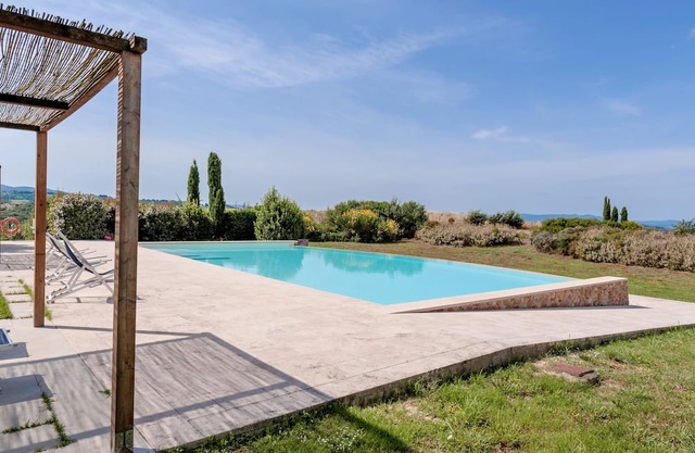 Apartment 'Il Fienile I' with Shared Pool, Private Garden and Wi-Fi