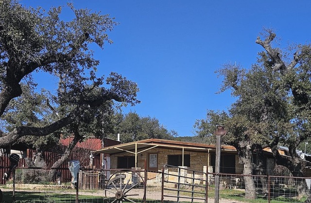 3 separate suites with 4 bedrooms overlooking Lake Buchanan in gated property.
