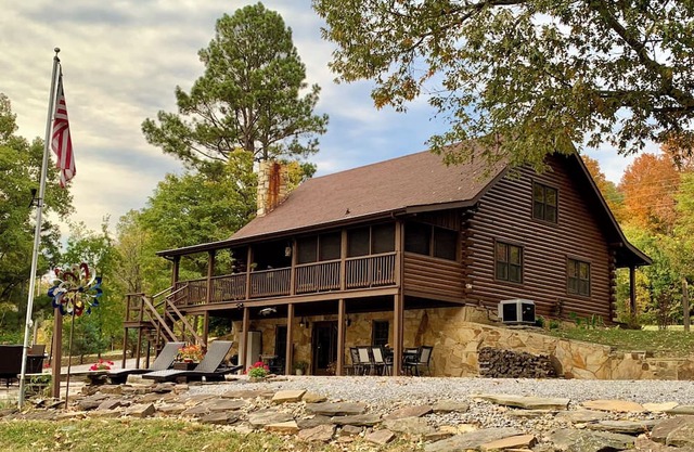 Log cabin w/walk out basement and loft located on Ohio Rivers edge.