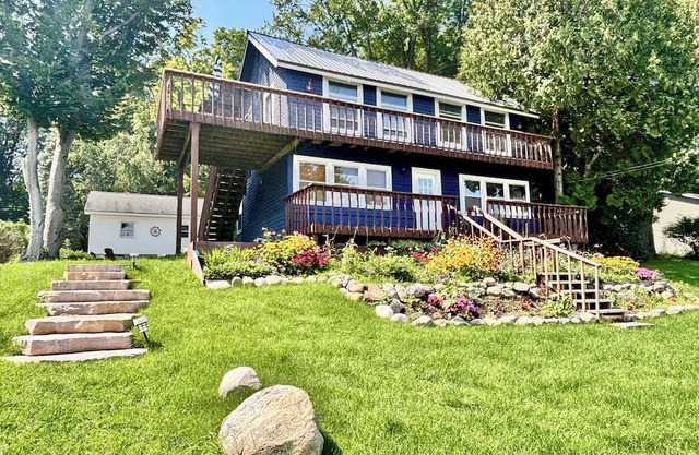 Cozy Main Level Torch Lake Stay with Private Entry & Fire Pit