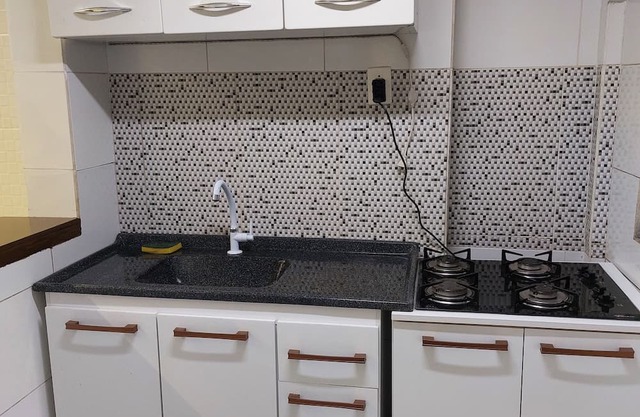 Quartos com área comum para hóspedes no Centro de Curitiba com WiFi