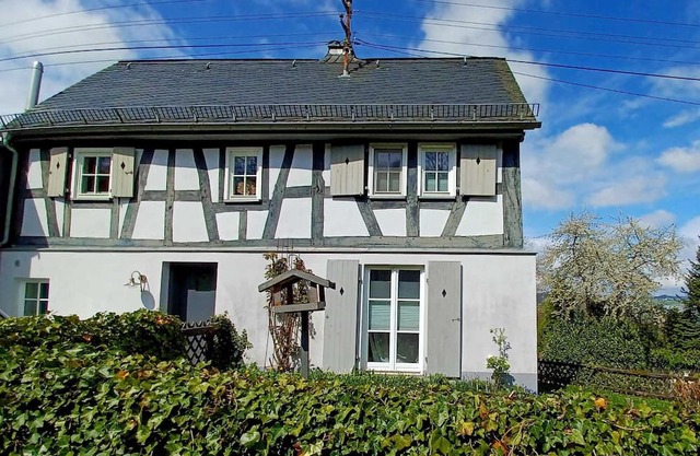 Historic half-timbered house on the edge of the forest with distant views. Quietly situated near Limburg.