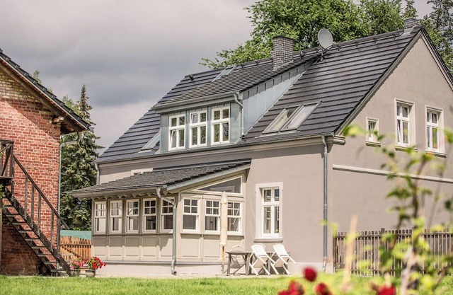 Landhaus hinter'm See vacation apartment Landliebe luxurious winter garden tiled stoves