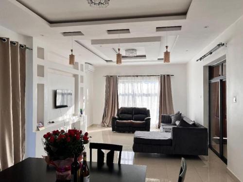 Executive 4 bedroom house with 4 beds .